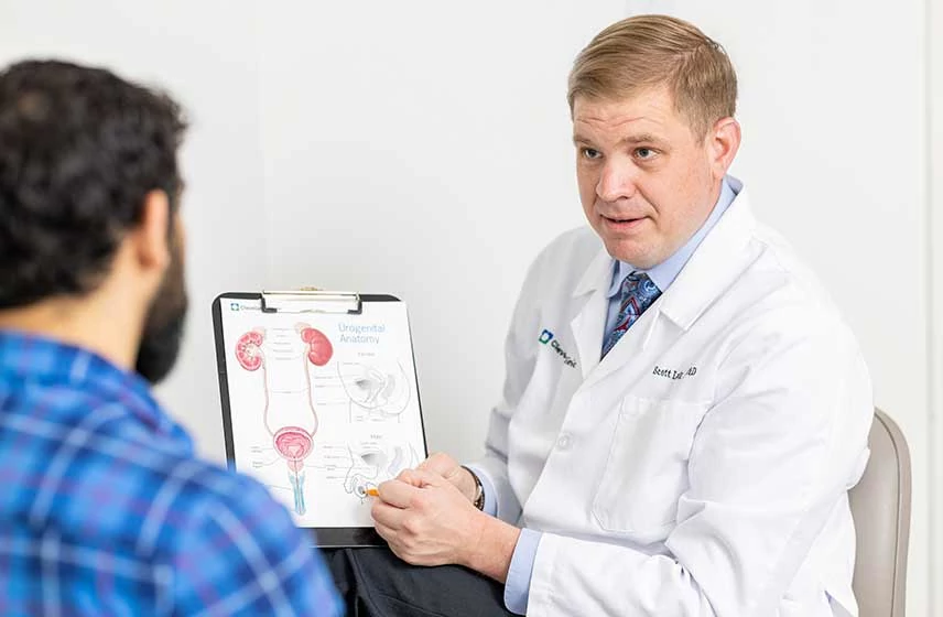 Doctor consulting a male patient about TRT.